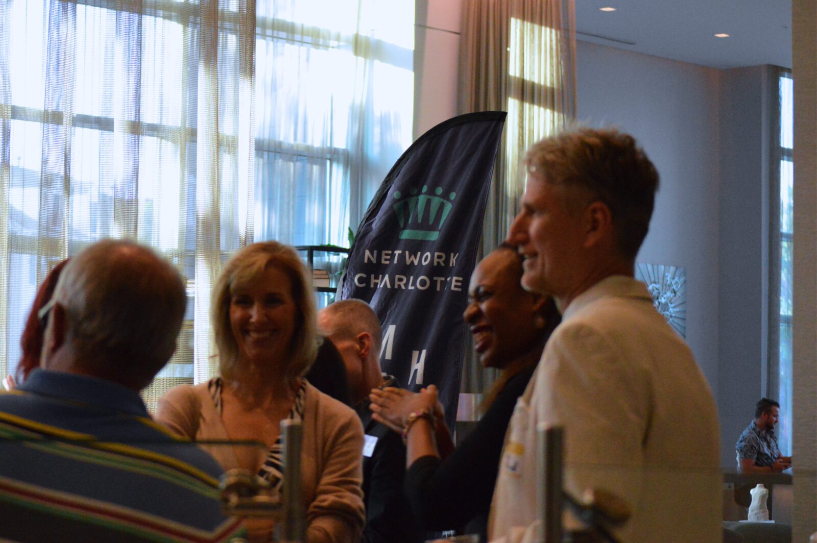 Networking toast at AC Hotel Ballantyne